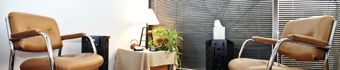 Two chairs facing each other in a Counseling Center office